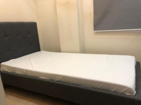 Comfy Room With Single Sized Bed, Study Space, Closet, and WiFi
